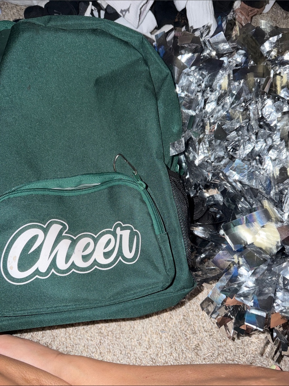 Green Backpack cheer and silver pompons